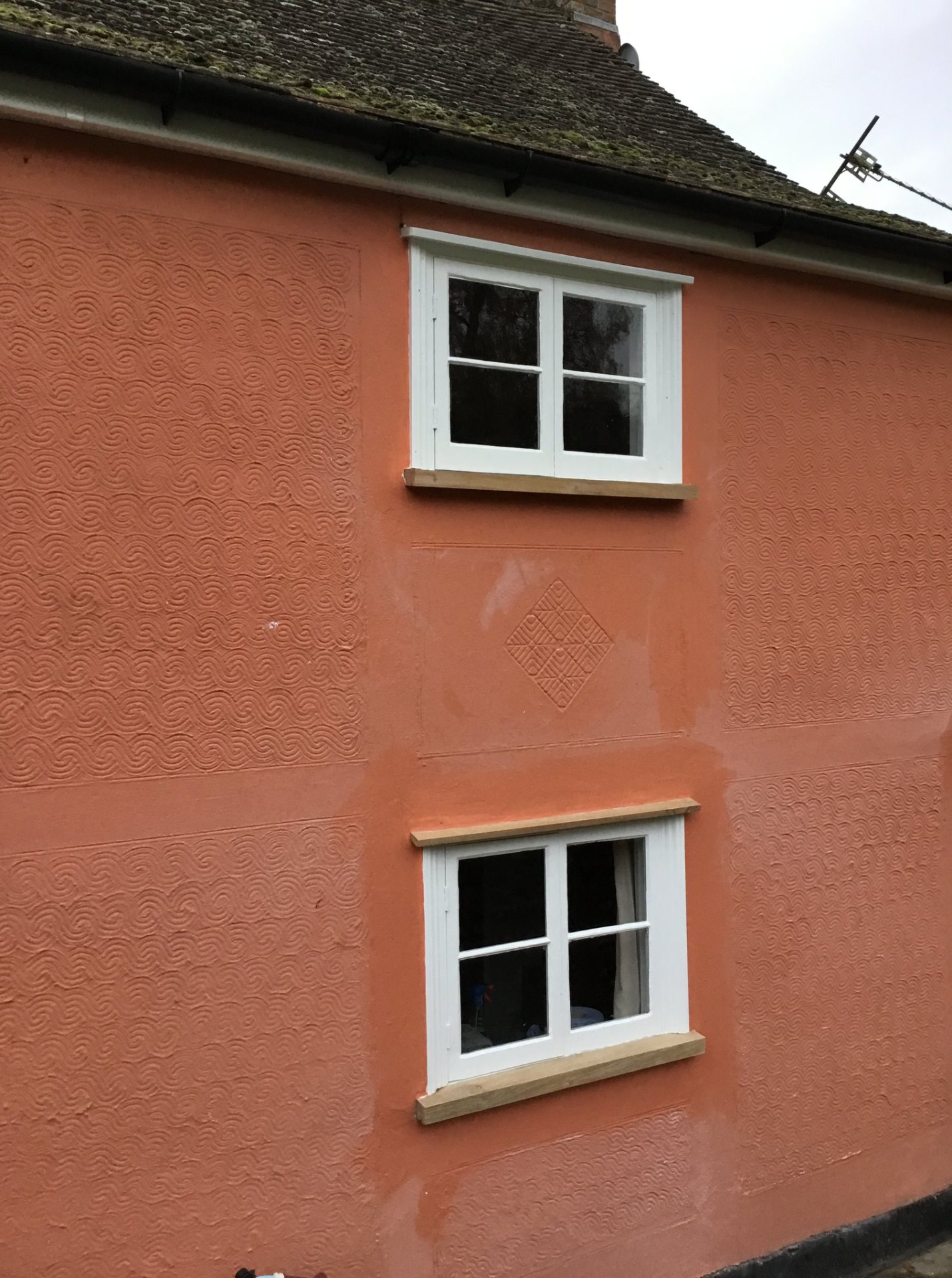 Traditional rendered cottage exterior in Suffolk