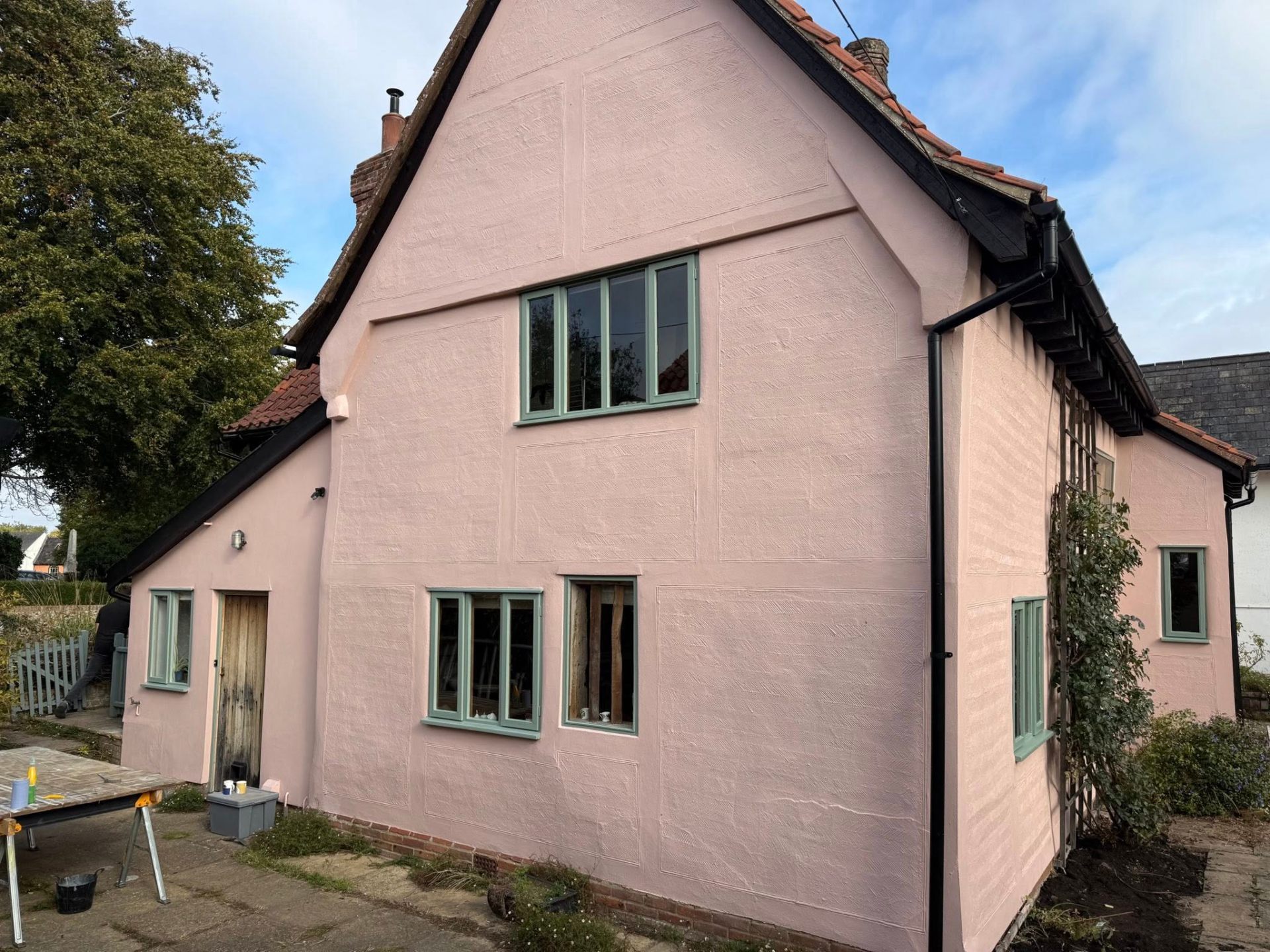 Lime-rendered period cottage by David Price Building Services in Suffolk