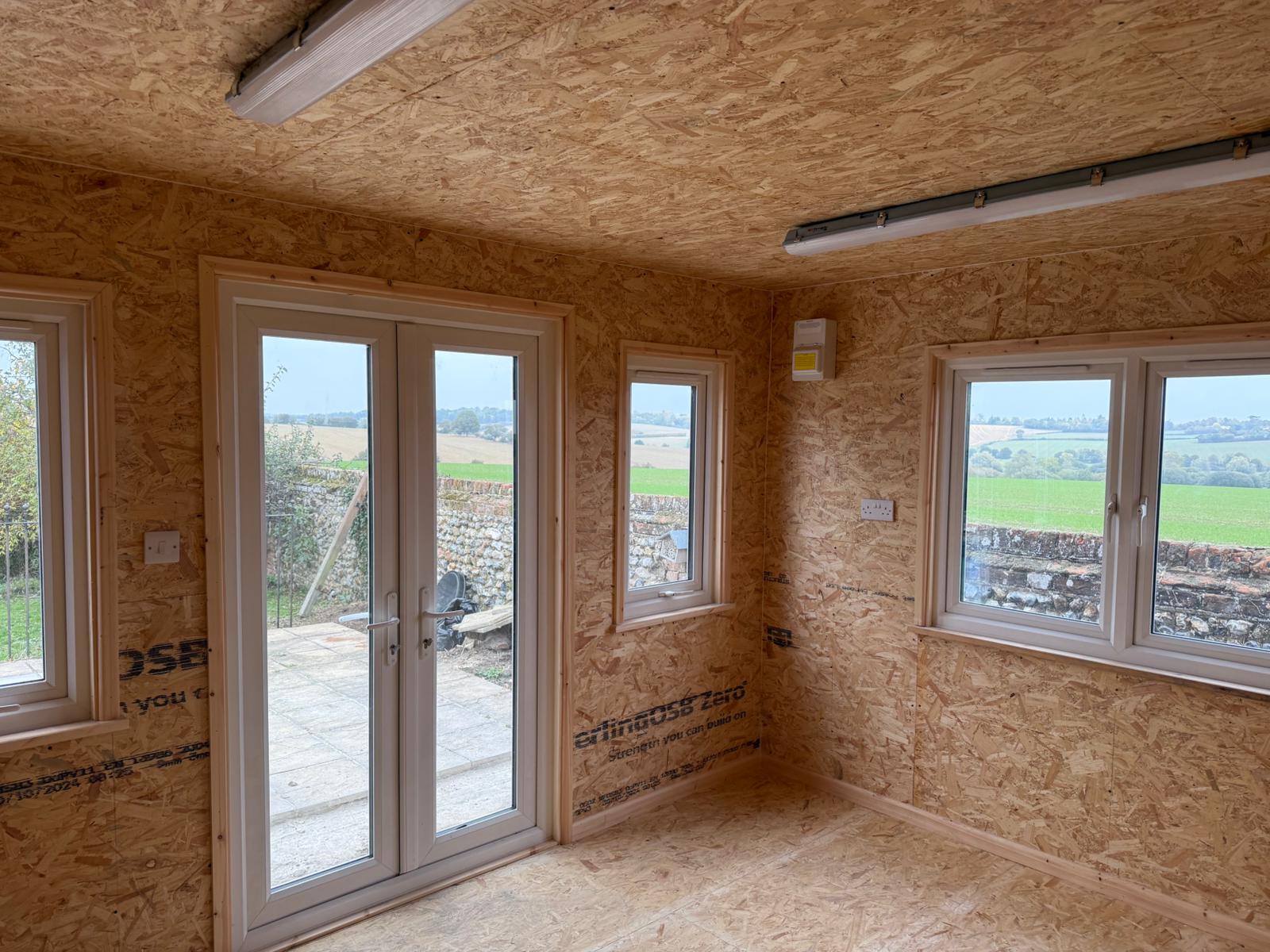 Garden room interior with insulated board finish in Suffolk