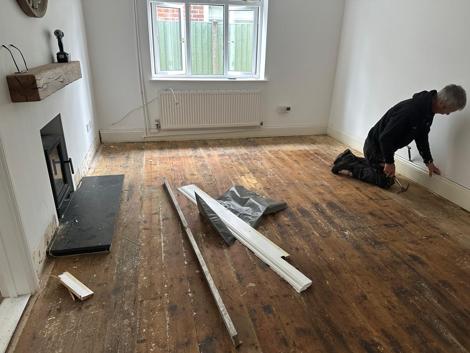 Floorboards exposed before decorating and finishing in Suffolk