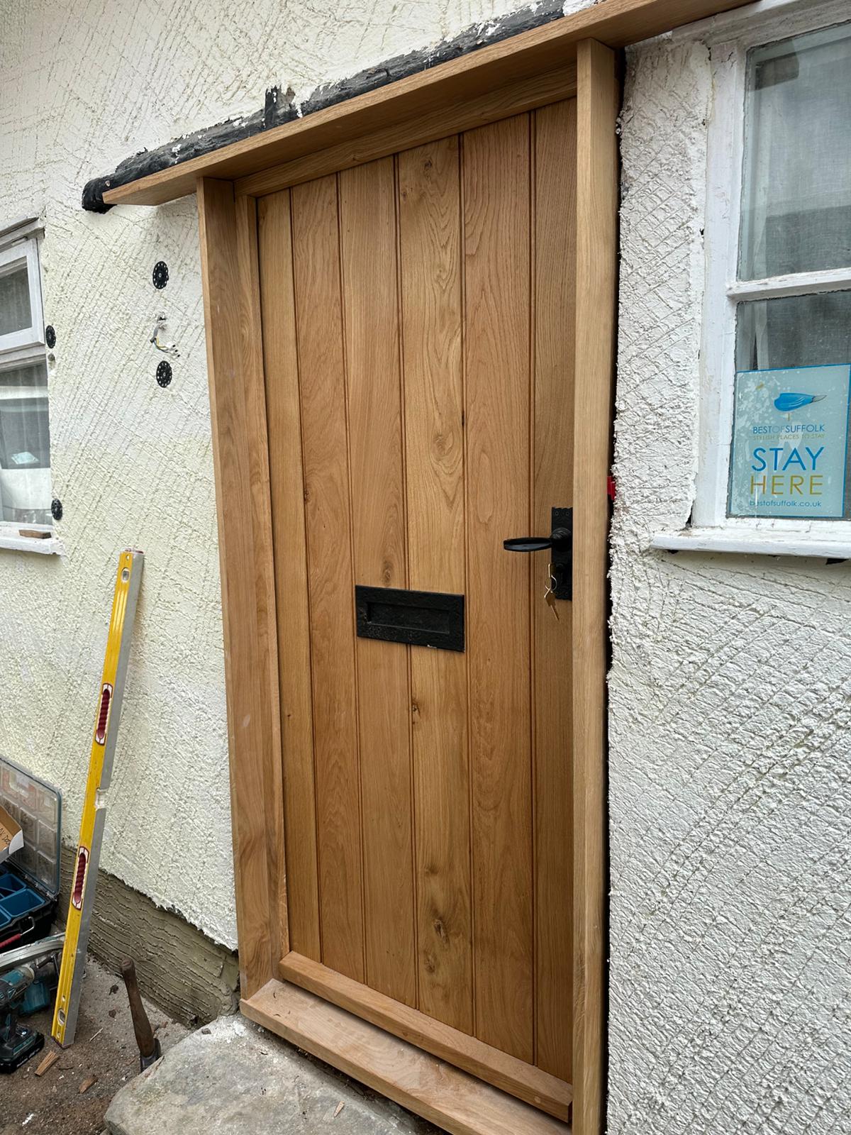 Handmade oak front door fitted to a Suffolk property