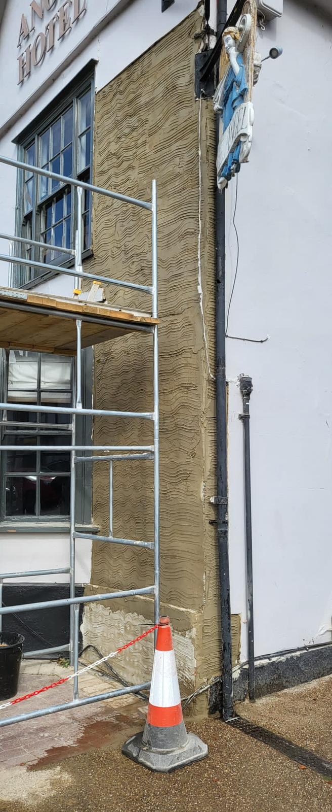 Lime render applied to a period property wall in Suffolk