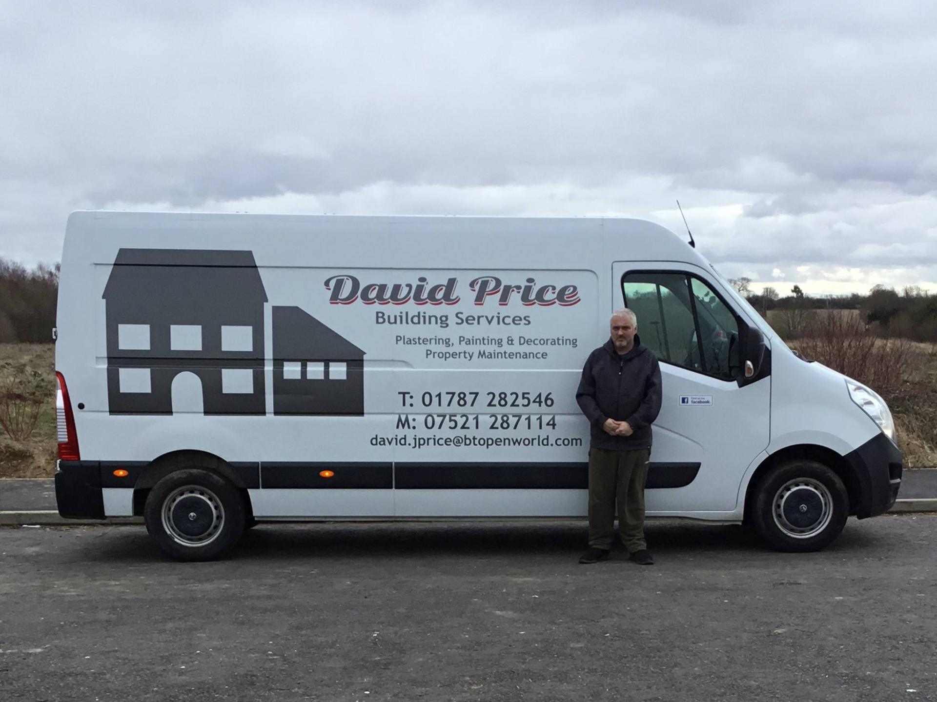 David Price standing beside the David Price Building Services van in Suffolk