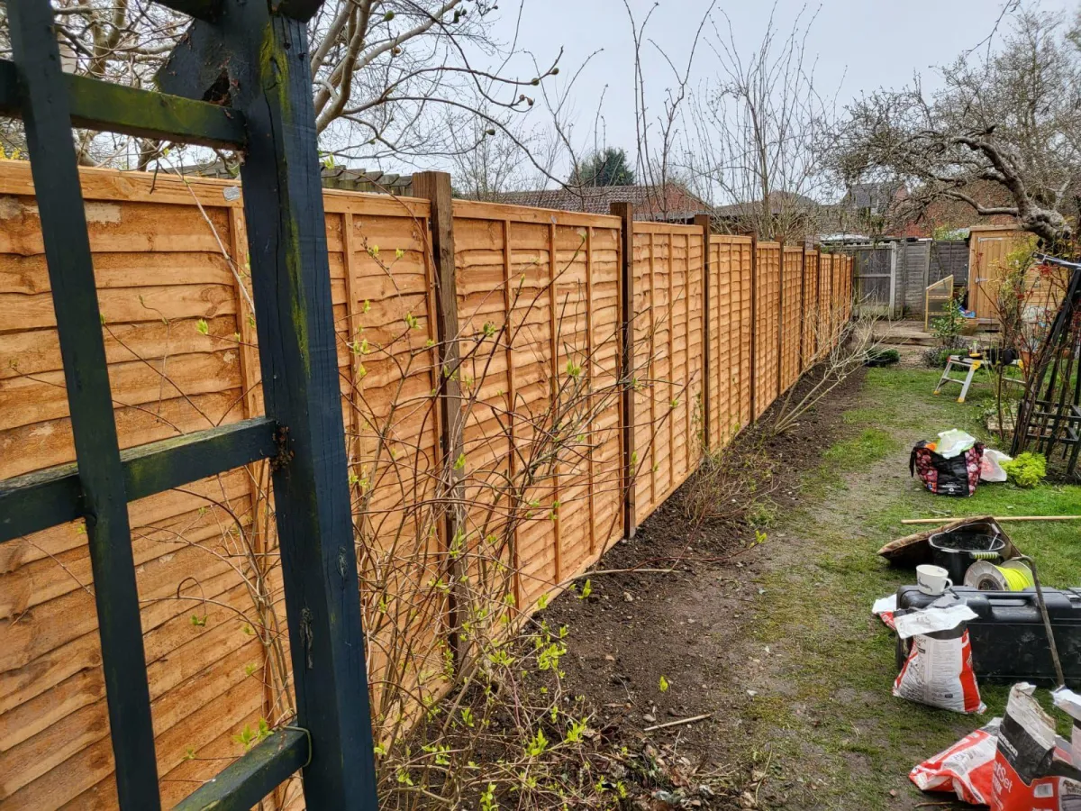 Closeboard timber fence installed by David Price Building Services in Suffolk