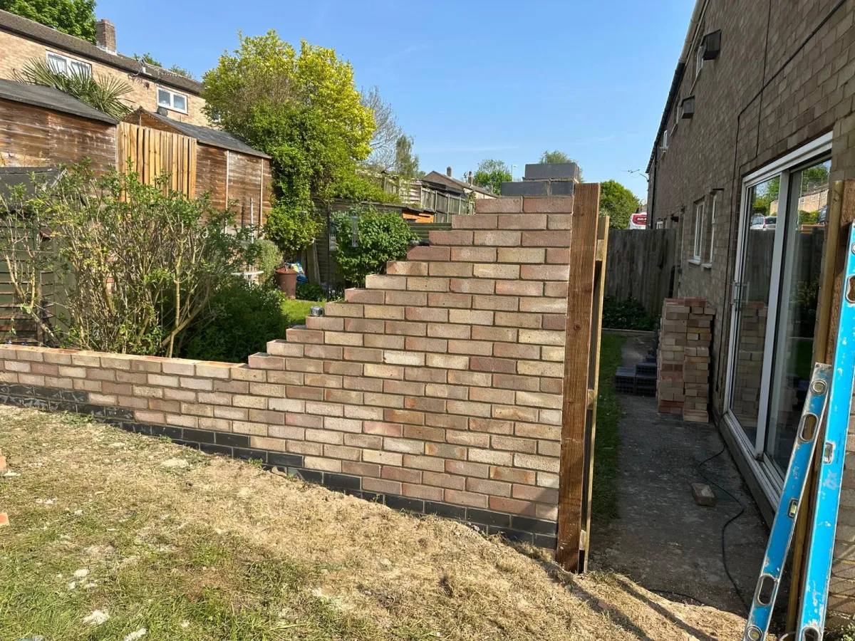Timber fence panels and posts fitted in a Suffolk garden